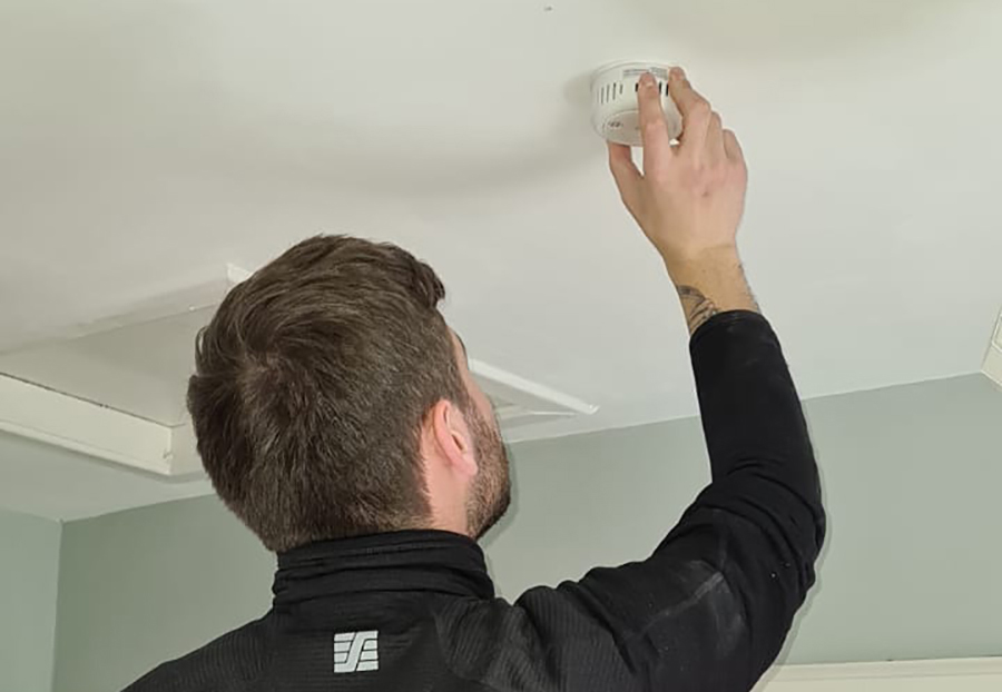 Electrician in Edinburgh carrying out Smoke Alarm Installation